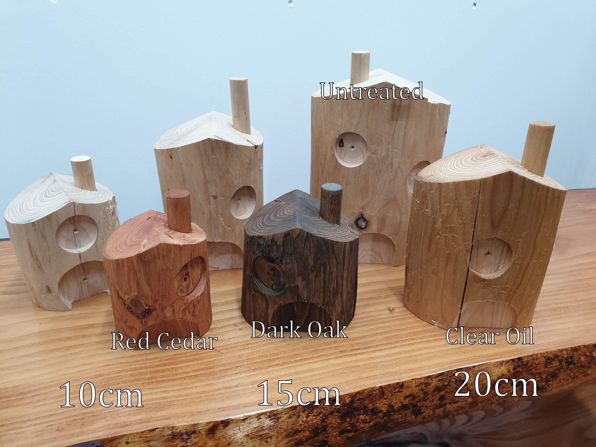 The same photo as the first one with 6 houses but with details like size and treatments clearly labelled on each one.