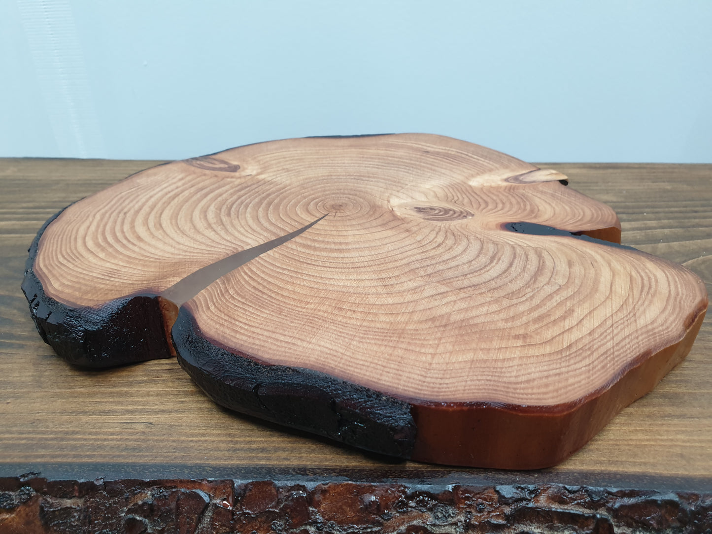 A large place mat with a resin filled split