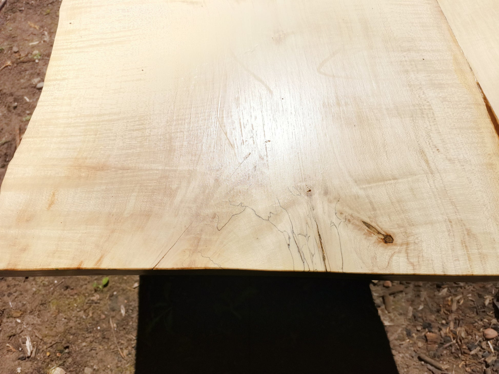 closeup of spalting in a sycamore table