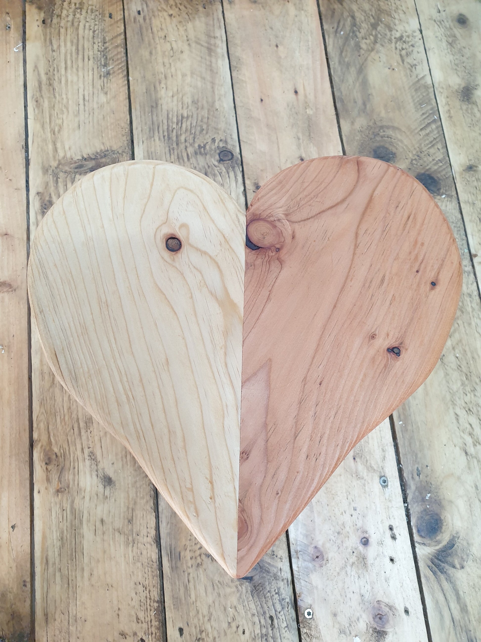 A photo of just the stool from above looking down at the colour difference and other characteristics in grain and knots.