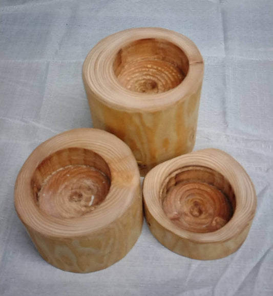 three log tea light holders without candles