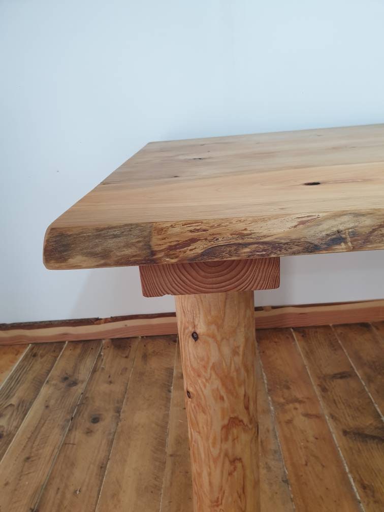 close up of the leg connection of a customizable wooden table