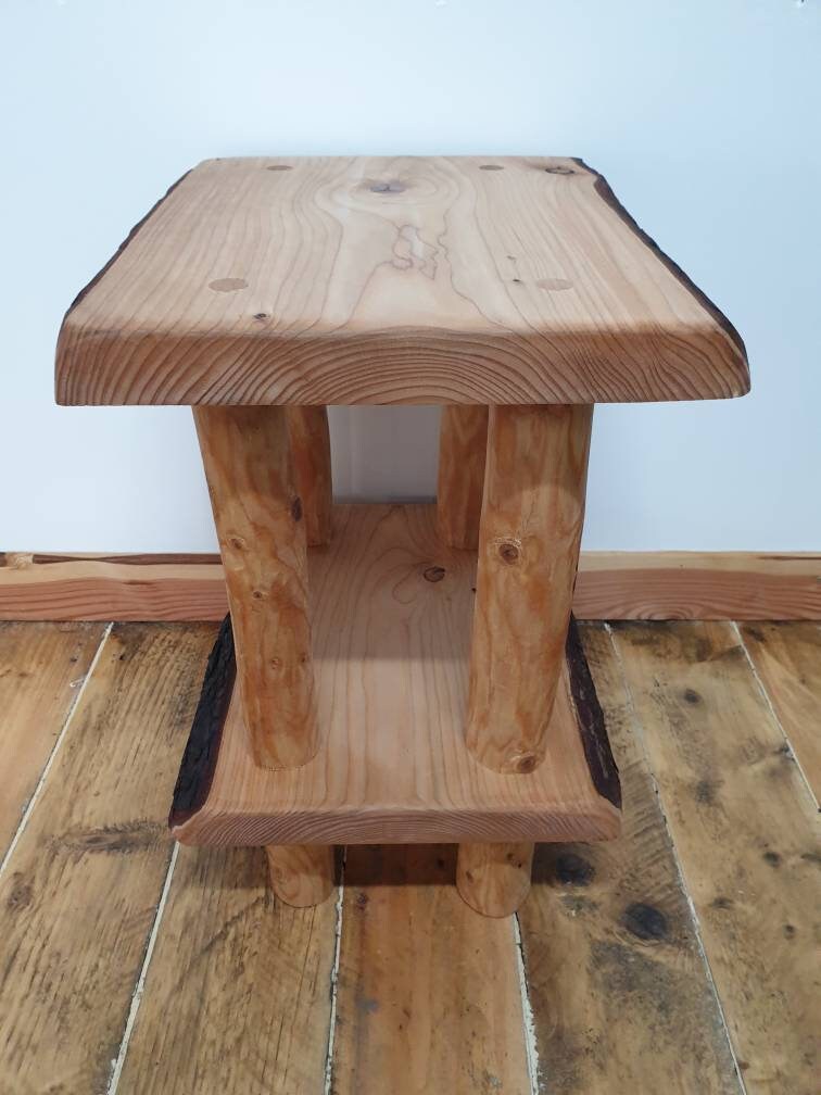 A view showing off the end grain on two of the sides of a wooden bedside table