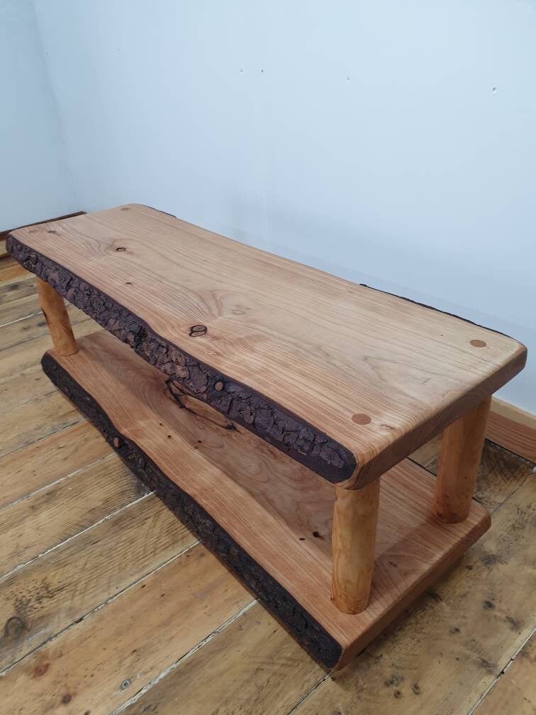 A dynamic and active shot of a coffee table as it heroically ponders its own utility. "Am I merely a display piece? Or is someone actually going to use me to store items?" A difficult question, but alas no answer seems to come to the table as it struggles through this philosophical quagmire of it's own making.