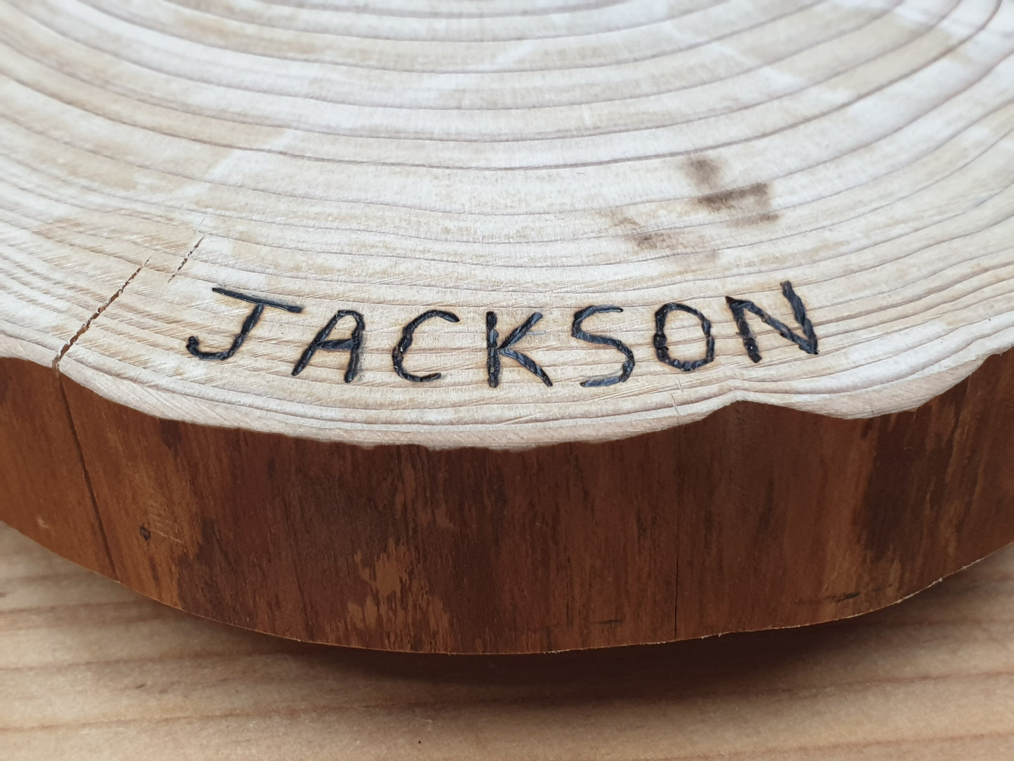 This centerpiece is called "Jackson".  Not many centerpieces have names. Fewer still have their names written on their tops.
Jackson is proud of his name. It is a good name.