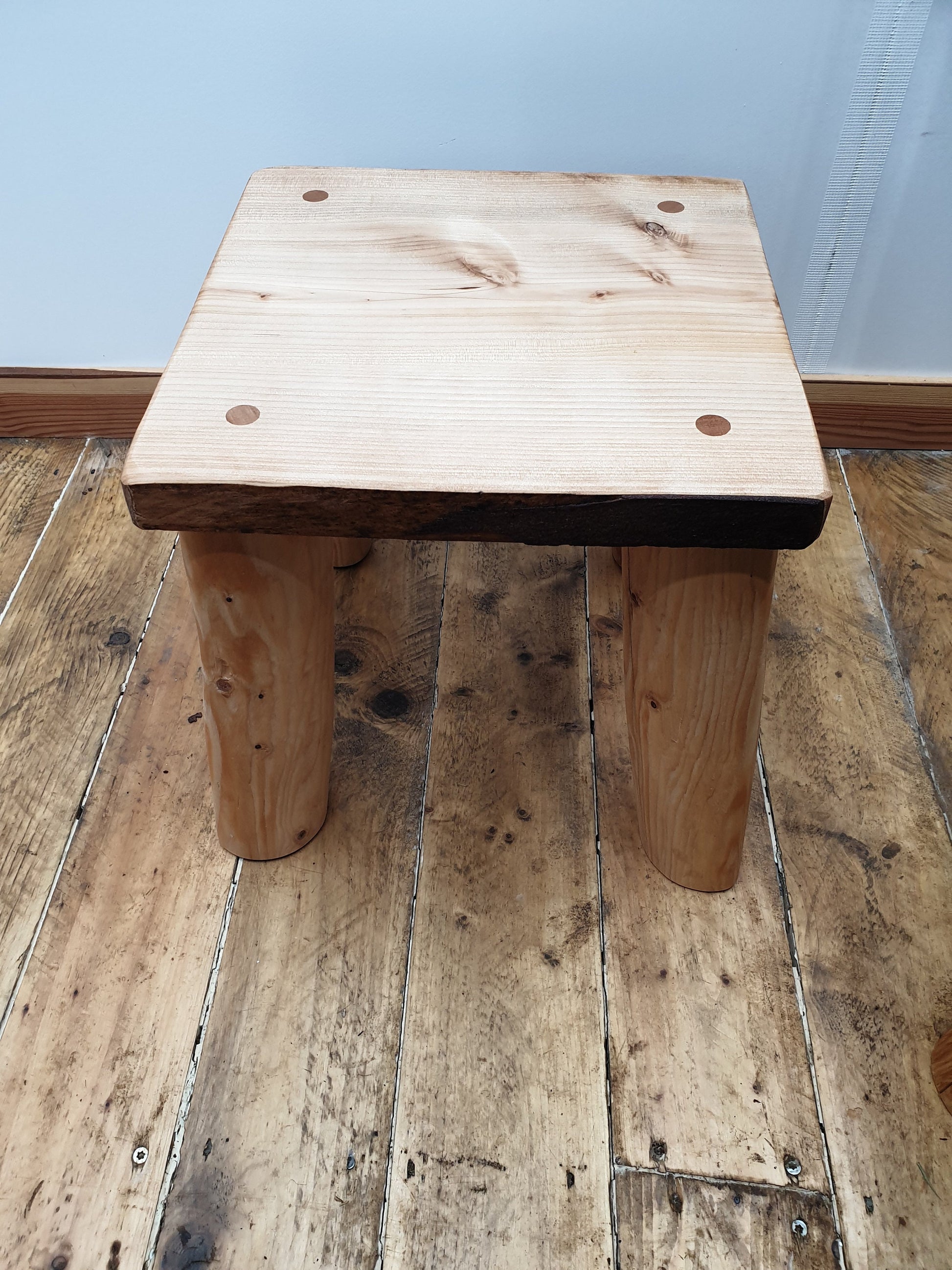 one medium square stool