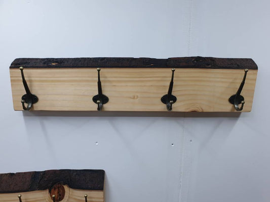  A 70cm coat rack from the front aspect with just 4 widely spaced hooks, also made from spruce.